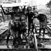 Playing in Monsoon Dhaka by Jan Møller Hansen - Photojournalism, Street Photography, Documentary Photography, Black and White Photography, Dhaka