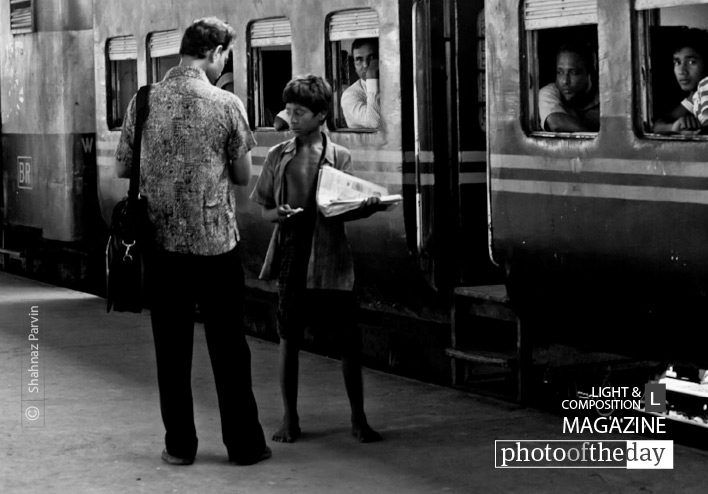 The Paperboy, by Shahnaz Parvin - Documentary Photography, Photojournalism, Photo of the Day, Photography Awards,  Street Photography
