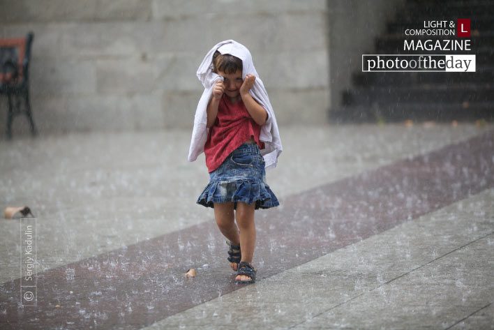 Running in the Rain by Sergiy Kadulin - Travel Photography, Photojournalism, Photography Awards, Art Photography, Online Photography Courses