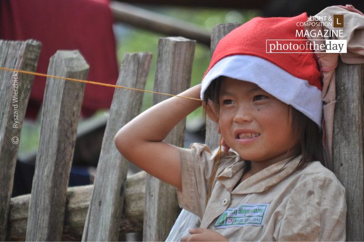 Jumping Rope Girl, by Ryszard Wierzbicki - Candid Photography, Photojournalism, Photography Award,  Award Winning Photo, Laos