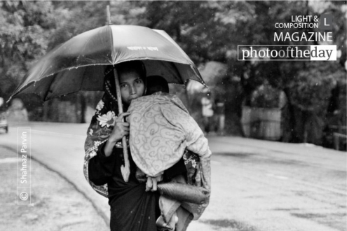 The Mother and the Rain, by Shahnaz Parvin - Documentary Photography, Photojournalism, Award Winning Photography, Photo of the Day,  Art Photography