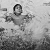 Splashing, by Zoe Ladika - Photojournalism, Black and White Photography, Action Photography, Photography Awards, Photo of the Day