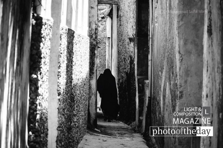 Across the Alley, by Mohammad Saiful Islam - Photojournalism, Black and White Photography, Documentary Photography, Photography Awards, Online Photography Courses