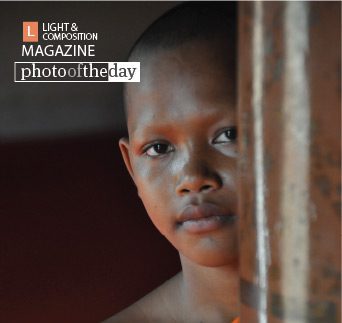 A Young Monk, by Ryszard Wierzbicki - Portrait Photography, Photojournalism, Award Winning Photography, Photography Awards,  Art Photography