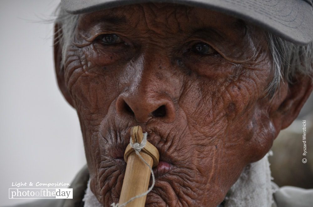 The Piper, by Ryszard Wierzbicki - Candid Photography, Photojournalism, Award Winning Photography, Photography Awards, Ryszard Wierzbicki