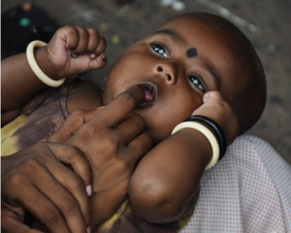 A Street Baby, by Ryszard Wierzbicki - Photojournalism, Street Photography, Documentary Photography, Ryszard Wierzbicki, Photography Awards