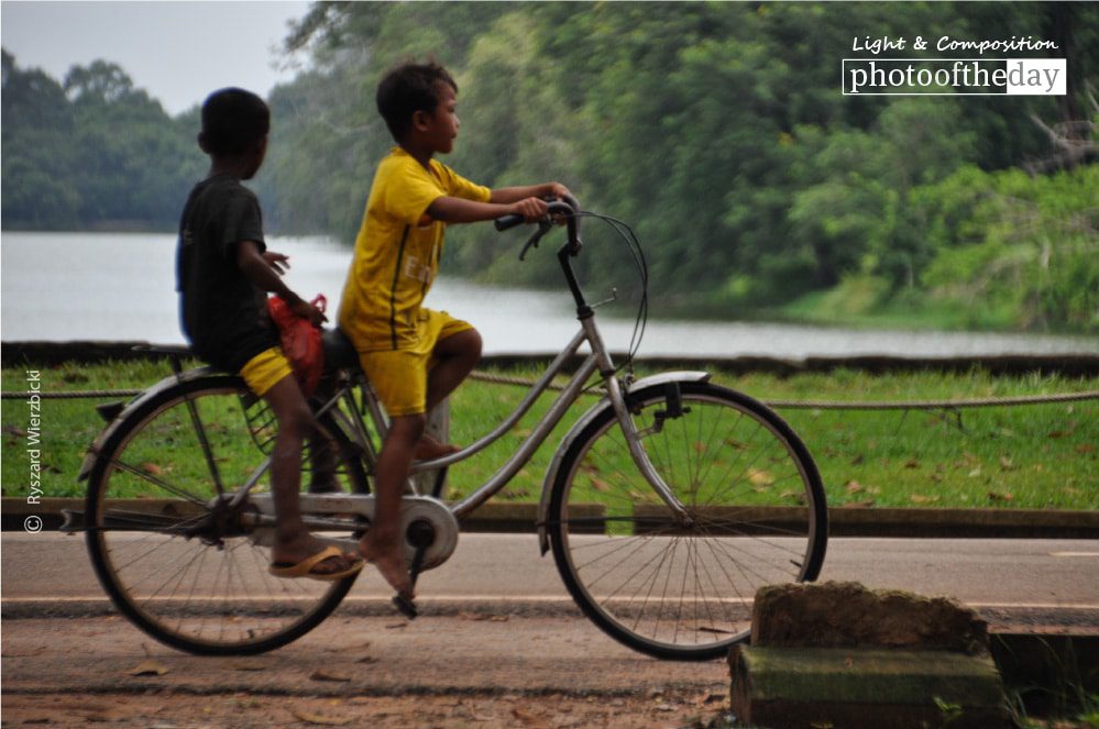 Angkor Cyclists, by Ryszard Wierzbicki - Travel Photography, Award Winning Photo, Angkor Wat, Cambodia, Ryszard Wierzbicki