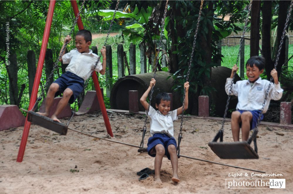 Boys on the Swings, by Ryszard Wierzbicki - Photojournalism, Travel Photography, Award-Winning Photography, Ryszard Wierzbicki, Photo of the Day