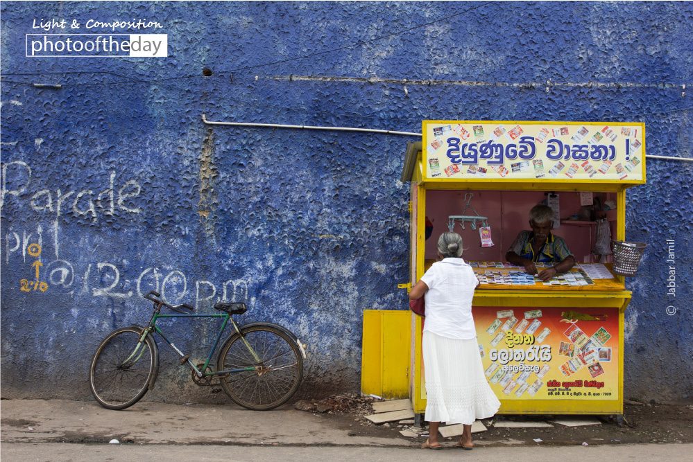 A Lottery Stall, by Jabbar Jamil - Street Photography, Color Photography, Photo of the Day, Photography Awards, Jabbar Jamil