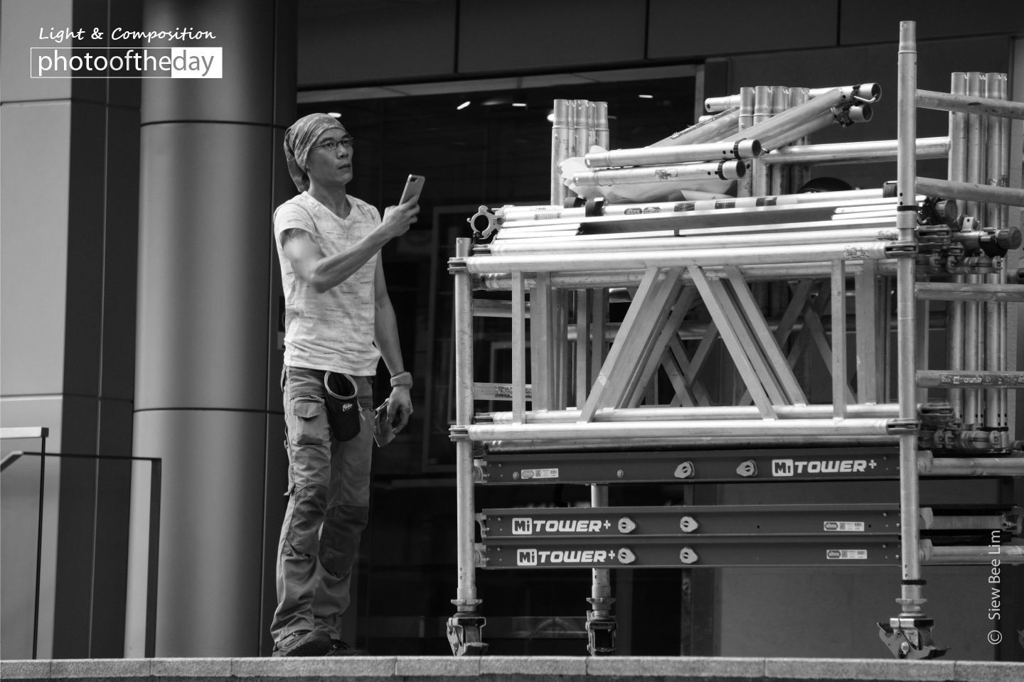 Heavy, by Siew Bee Lim - Street Photography, Photojournalism, Photography Awards, Photo of the Day, Siew Bee Lim