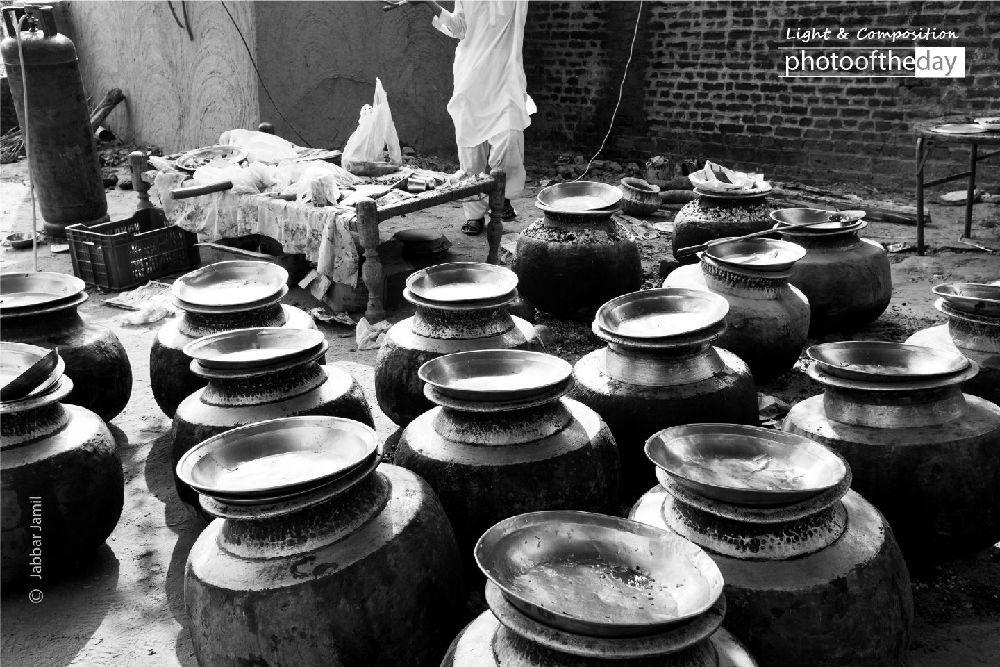 Preparing Food, by Jabbar Jamil - Photojournalism, Black and White Photography, Documentary Photography, Street Photography,  Wedding Photography