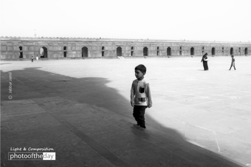 In the Badshahi Mosque, by Jabbar Jamil - Street Photography, Black and White Photography, Photojournalism, Photography Awards, Light & Composition University