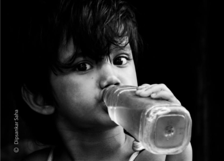 Staying Hydrated by Dipsankar Saha - Street Photography, Award Winning Photo, Photojournalism, Photography Awards, Light & Composition University