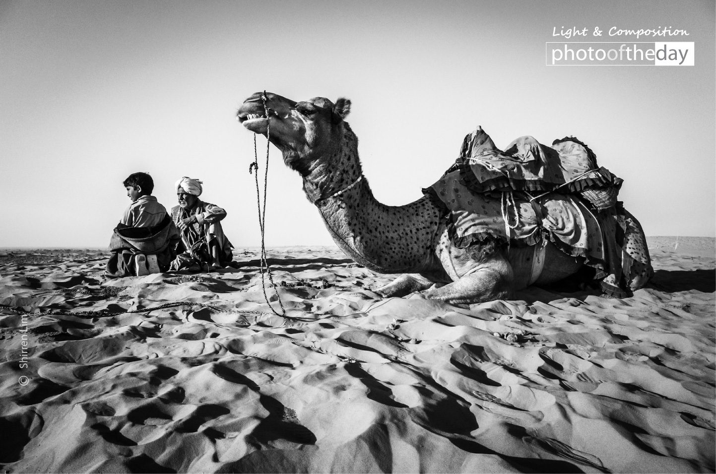 A Man, a Boy, and a Camel by Shirren Lim - Photojournalism, Black and White Photography, Award Winning Photography, Documentary Photography,  Photography Awards