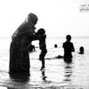 Beach Sunset with Granny by Andisiwe Boya - Photojournalism, Black and White Photography, Award Winning Photography, Photography Awards,  Andisiwe Boya