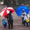 A Candid Moment at Batu Caves by Montasir Khandker - Photojournalism, Street Photography, Candid Photography, Photography Awards, Light & Composition University