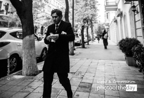 Men with Suit by Fidan Nazim Qizi - Street Photography, Photojournalism, Award Winning Photography, Photography Awards, Light & Composition University
