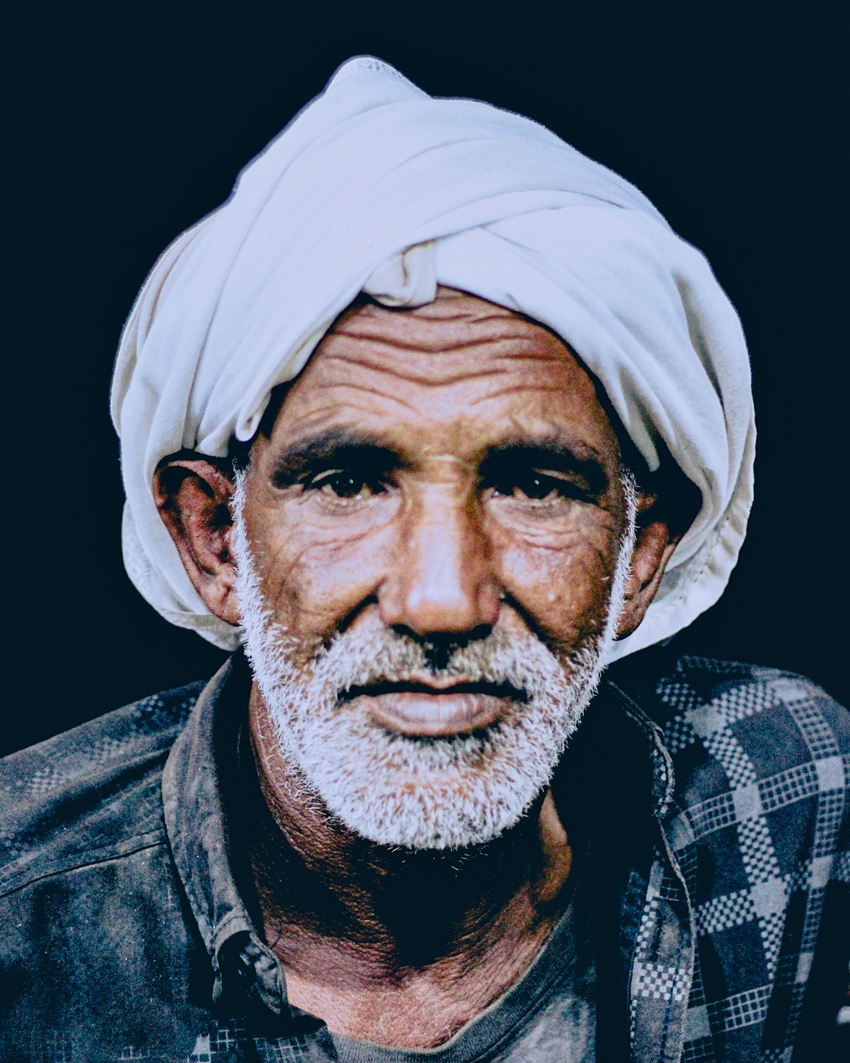 A Portrait of Endurance and Wrinkle by Asaad Nateel - Portrait Photography, Photojournalism, Photography Awards, Photo of the Day, Light & Composition University