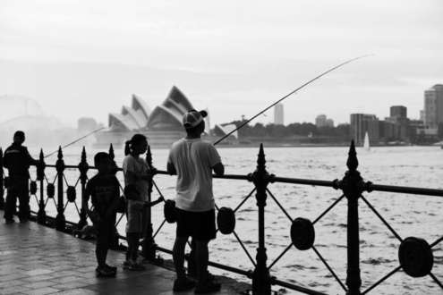 Fishing on the Harbour by Leanne Lindsay - Street Photography, Photojournalism, Art Photography, Photo of the Day, Light & Composition University