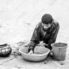 Man with Basins on the Sand - Fine Art Photography Print, Limited Edition Photography, Monochrome Photography, Documentary Photography, Nasrul
