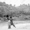 Two Children with a Reed on the Shore - Fine Art Photography Print, Limited Edition Print, Giclée Print,  Monochrome Photography, Children Photography