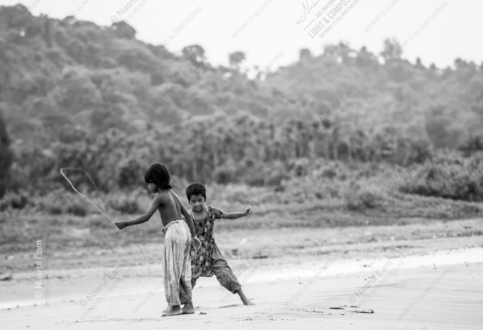 Two Children with a Reed on the Shore - Fine Art Photography Print, Limited Edition Print, Giclée Print,  Monochrome Photography, Children Photography