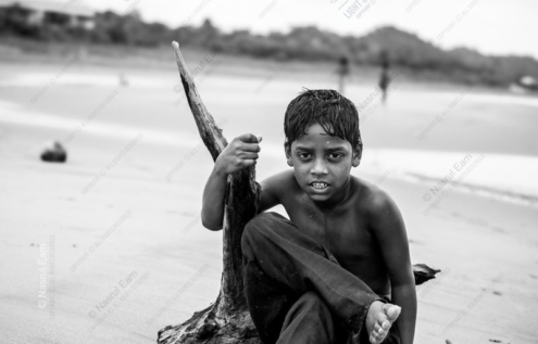 Boy with Driftwood on the Shore - Fine Art Photography Print, Limited Edition Photography, Giclée Print, Environmental Portraiture, Black and White Photography