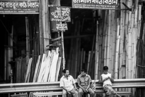 Men Seated Before a Wall of Bamboo - Fine Art Photography Print, Limited Edition Photography, Giclée Print,  Black and White Photography,  Art Photography Investment
