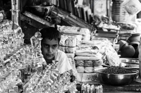 The Boy at the Crystal Bottle Stall - Fine Art Photography Print, Limited Edition Photography, Giclée Print, Black and White Photography, Art Photography for Sale
