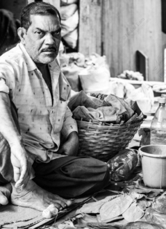 The Betel Leaf Vendor at His Stall - Fine Art Photography Print, Limited Edition Photography,  Museum-Quality Artwork, Black and White Photography, Art Photography for Sale