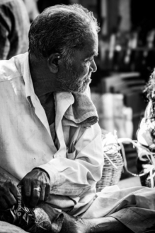 The Seated Vendor in Profile - Fine Art Photography Print, Limited Edition Photography, Black and White Photography,  Museum-Quality Print,  Art Photography for Sale