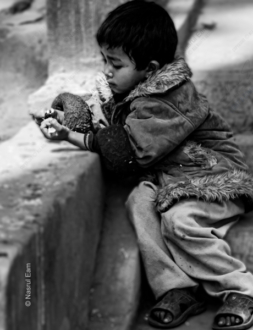 Hunched over a Crumbling Piece of Bread - Fine Art Photography Print, Limited Edition Photography, Giclée Print,  Documentary Photography,  Art Photography for Sale