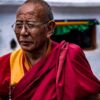 Elderly Monk in Crimson Robes