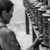 A Pilgrim's Touch at the Prayer Wheels