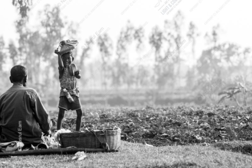 A Boy's Joyful Offering in the Field - Fine Art Photography Print, Limited Edition Photography, Museum-Quality Artwork, High-End Photography, Art Photography Investment