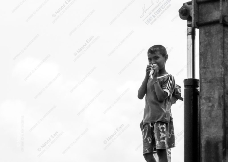 Boy with a Treat by the Steel Post - Fine Art Photography Print, Limited Edition Photography, Giclée Print, Monochrome Photography,  Art Photography