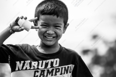 A Boy's Playful Salute - Fine Art Photography Print, Limited Edition Photography, Museum-Quality Print, Black and White Photography, Art Photography