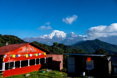Red Roofs and Sacred Peaks