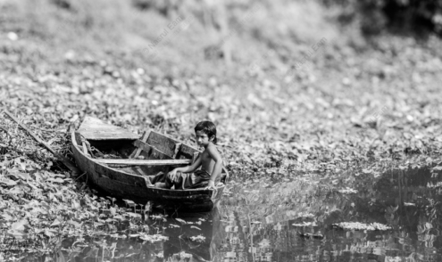 Boy in a Wooden Boat - Fine Art Photography Print, Limited Edition Photography, Monochrome Photography, Boy in Boat, Nasrul Eam