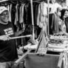 The Laughing Man at the Market Stall - Fine Art Photography Print, Limited Edition Photography, Black and White Photography, Documentary Photography, Art Photography for Sale