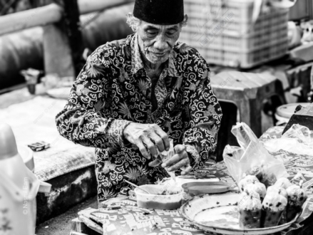 The Elder Baker at His Market Stall