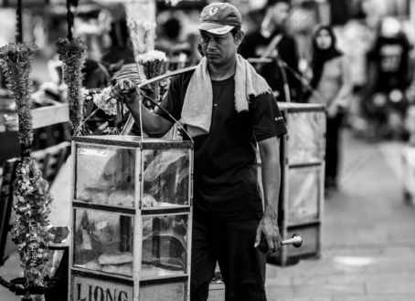 The Vendor with the Glass Case - Fine Art Photography Print, Limited Edition Photography, Contemporary Art Photography, Documentary Photography, Black and White Photography