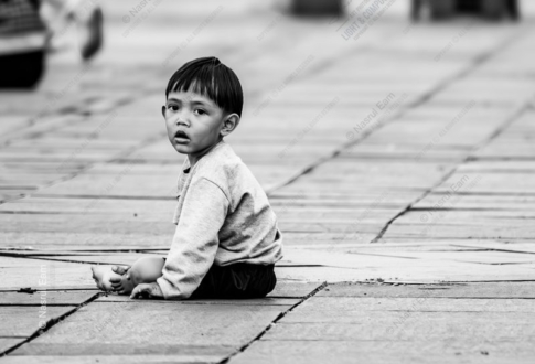 The Solitary Child on the Walkway