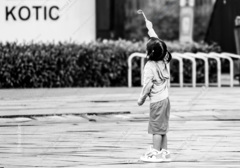 The Girl with the Raised Wand