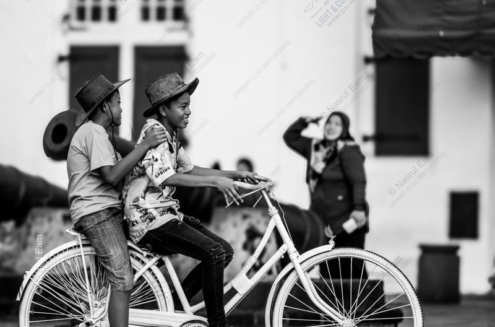 Two Boys on a White Bicycle - Fine Art Photography Print, Limited Edition Photography,  High-End Photography Prints,  Art Photography Collectors, Museum-Quality Photography