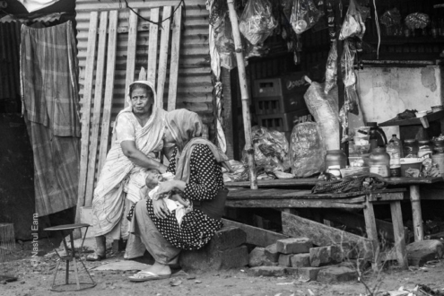 Women and Newborn at a Roadside Shop - Fine Art Photography Print, Limited Edition Photography, Giclée Print, Documentary Photography, Nasrul Eam