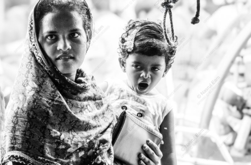 A Woman's Arms, A Child's Yawn