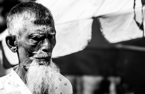 Elderly Man Beneath a White Umbrella - Fine Art Photography Print, Limited Edition Photography, Black and White Portrait,  Museum-Quality Photography,  Art Photography for Sale