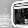 A Child's Gaze from the Train Window