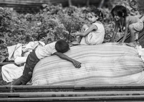 Children on a Bale by the Tracks
